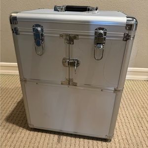 Make up case on wheels.  Like new used once.